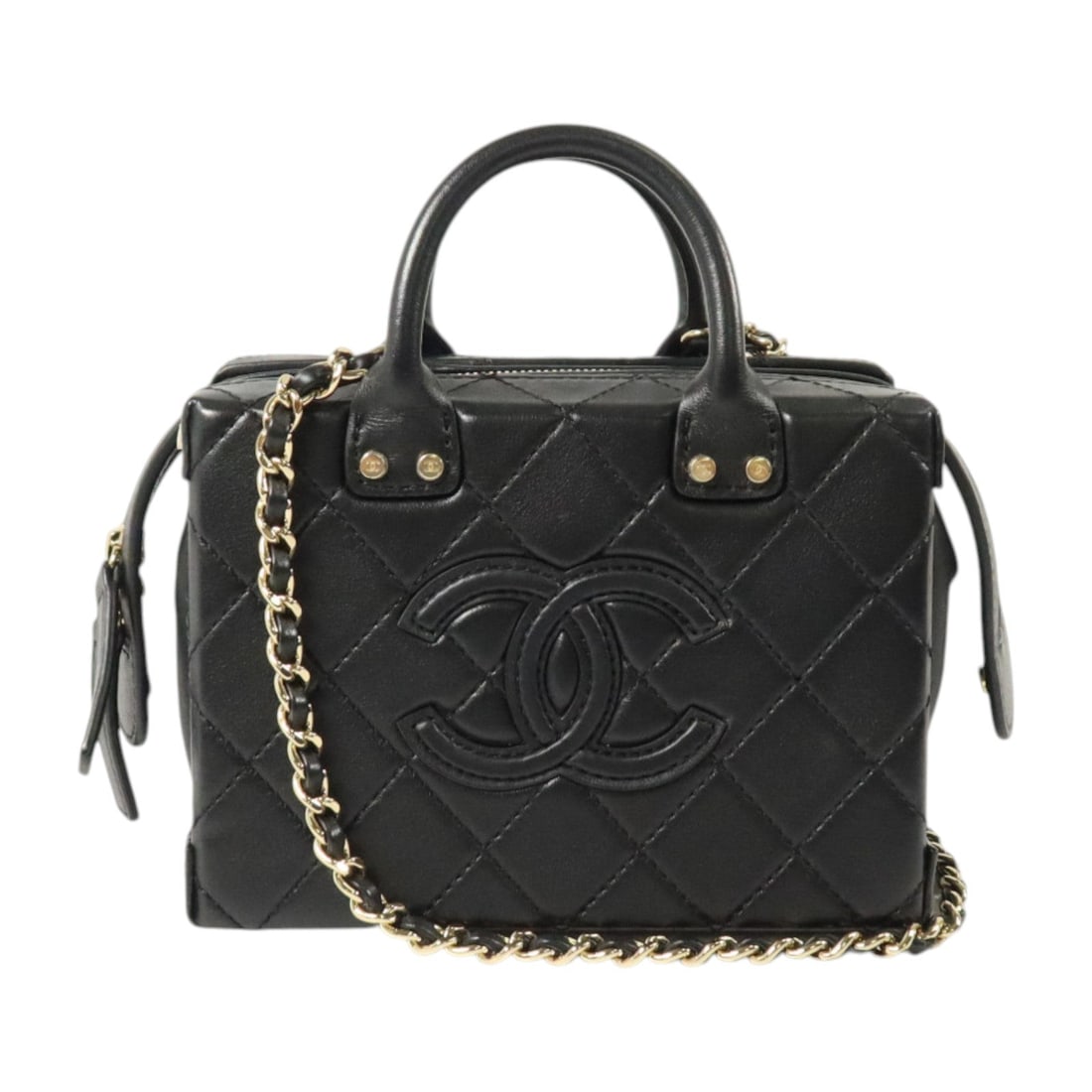 Chanel Vanity Case Small GHW Black: Black Vanity Case Small chain shoulder bag with GG GHW in Calfskin (cowhide). Includes storage bags and hologram sticker. 15 x 11 x 8.5 cm; shoulder up to 114 cm. Model AS3344.