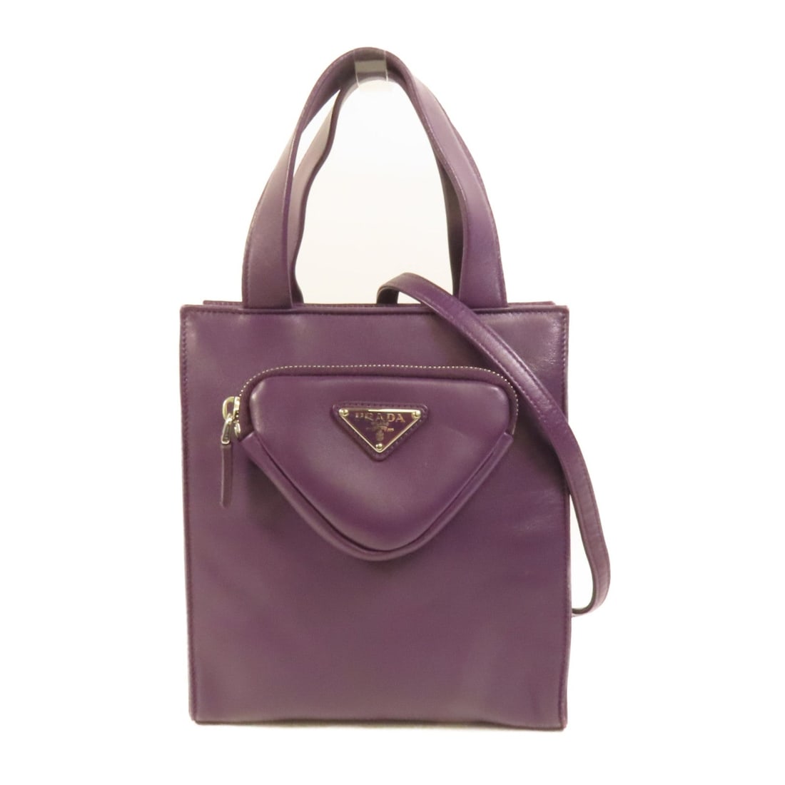 Prada SHW 2 Way Shoulder Purple: SHW 2 way shoulder bag in purple lambskin (sheep leather). Size: W19 x H22 x D7 cm. Handle 30 cm. Shoulder 112-122 cm. Includes storage bag and shoulder strap.