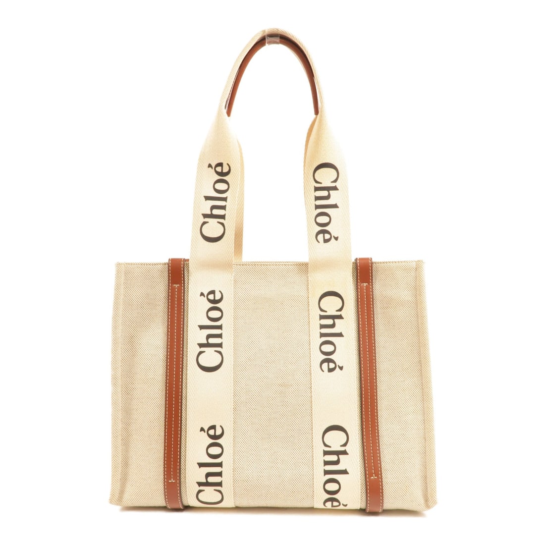 Chloe Woody Tote Beige Canvas: Woody tote bag shoulder bag in beige and brown canvas. Size: W35 x H27 x D12 cm. Shoulder 58 cm.