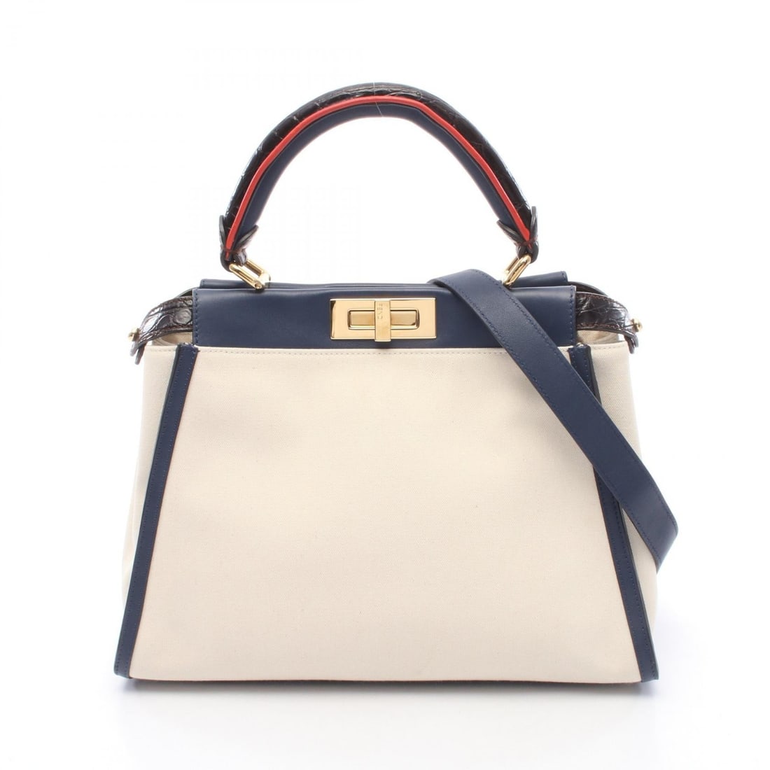 Fendi Peekaboo Regular Beige Multi: Beige, navy, and red Peekaboo Regular 2WAY handbag in canvas and leather. Model 8BN290. Includes shoulder strap. 34 x 24 x 13 cm. Handle 35 cm. Shoulder 94-112 cm.