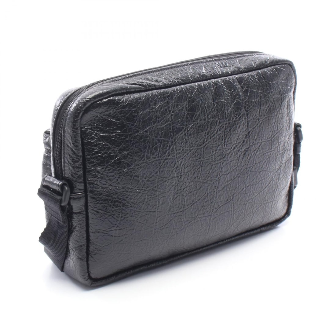 Balenciaga Explorer Camera Black: Black and white Explorer Camera shoulder bag in leather. Model 845592. No accessories. 24 x 16 x 3.5 cm. Shoulder 75-140 cm.