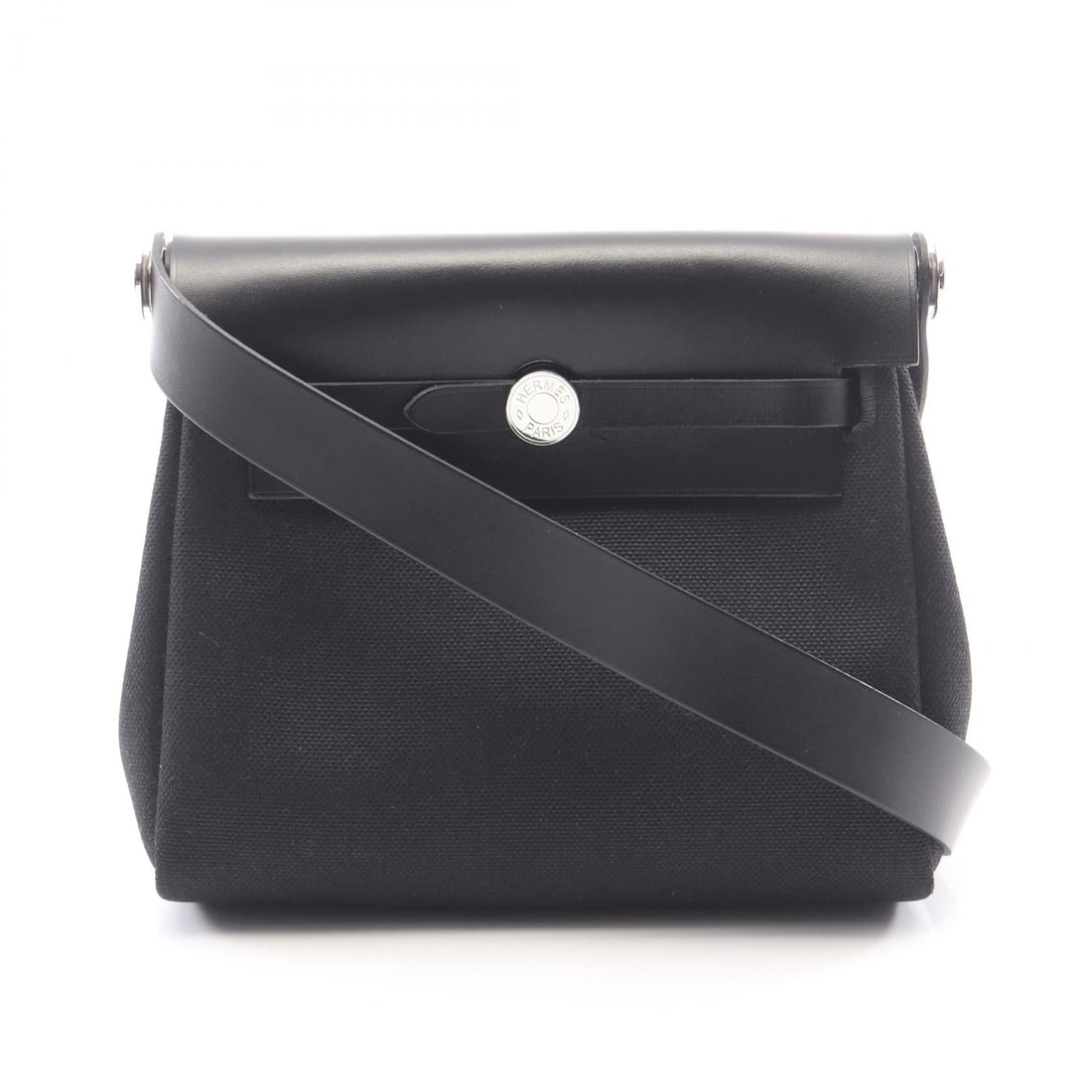 Hermès Herbag Zip Mini Black: Noir Black Herbag Zip Mini shoulder crossbody bag in Toile Military canvas and Vache leather hunter with SHW. No accessories. 20 x 16 x 7 cm. Shoulder 103 cm.
