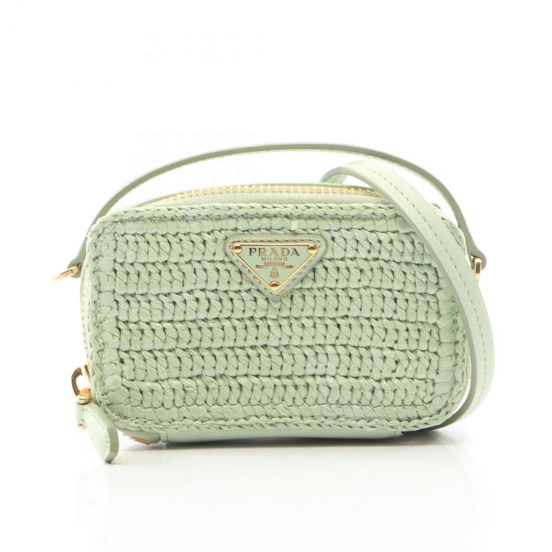 Prada Triangle Logo Mini Pouch: Green Triangle logo mini pouch shoulder crossbody bag in leather and raffia. Model 1NR025. No accessories. 11 x 6.5 x 3.5 cm. Handle 15 cm. Shoulder 113 cm.