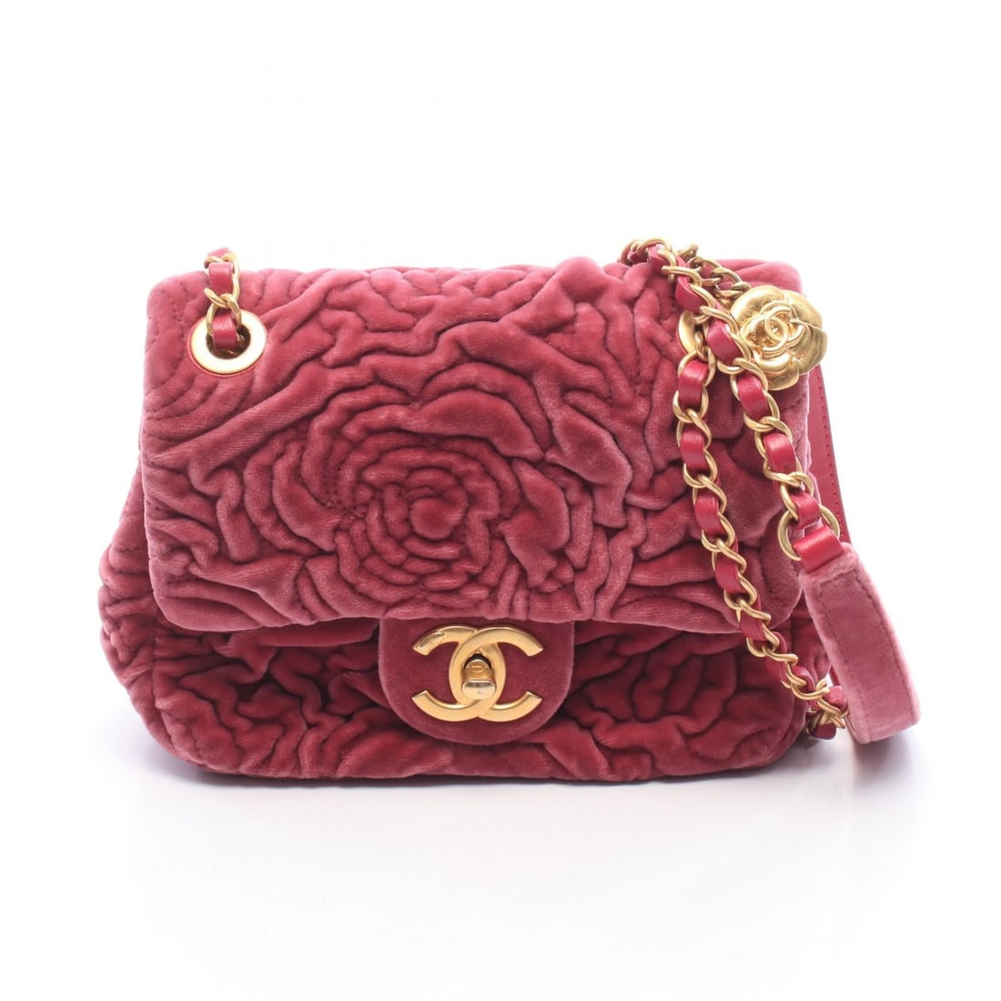 Chanel GHW Camellia Mini Pink: Pink Camellia Mini chain shoulder handbag in fabric and leather with GHW. No accessories. 17 x 14 x 7 cm. Strap drop 28 cm.