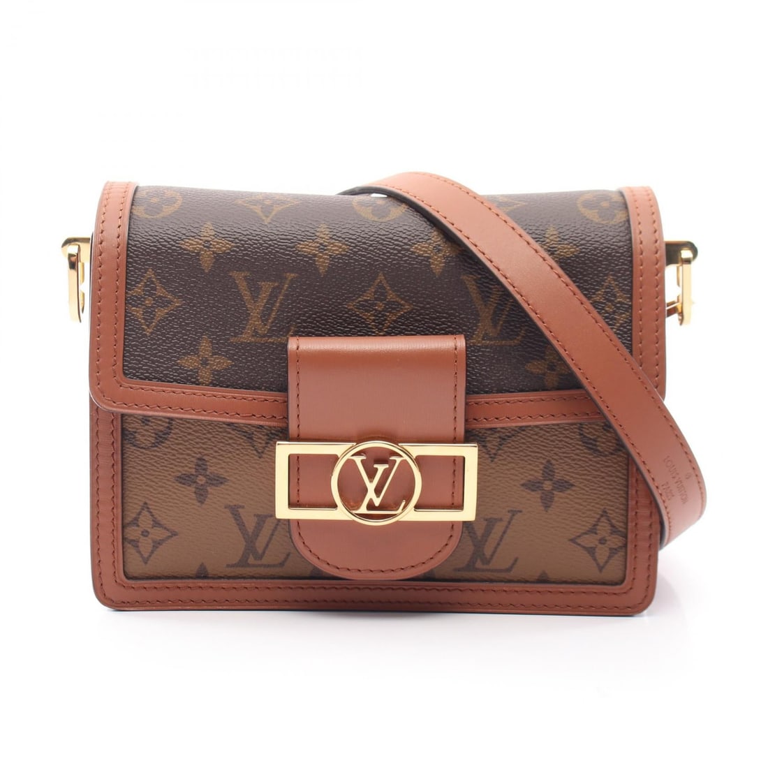 LV Dauphine Mini Reverse: Beige and brown Dauphine MINI shoulder bag in Monogram reverse PVC coated canvas and leather. No accessories. 19.5 x 15 x 4/4 cm. Shoulder 65-110 cm.