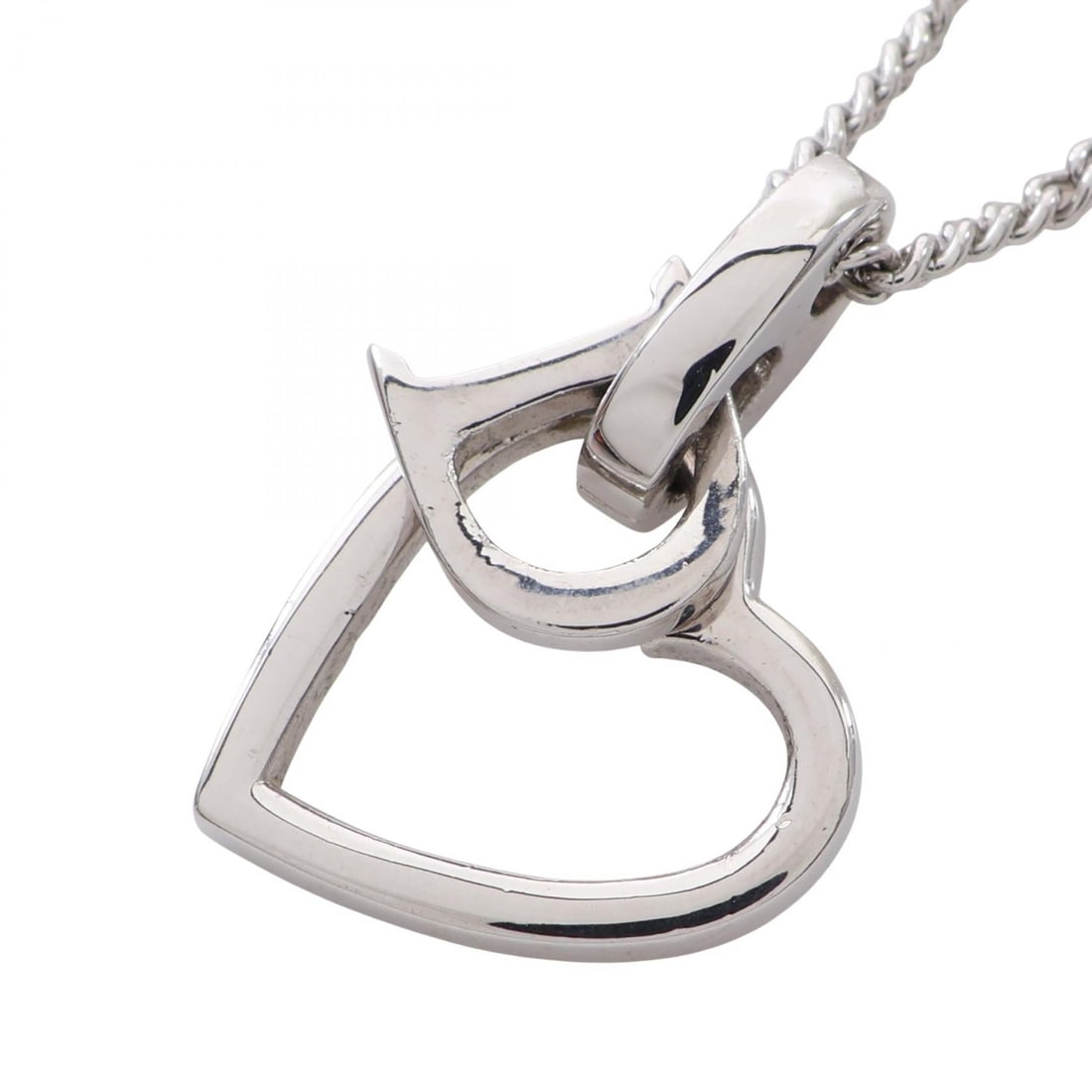 Dior D Logo Heart Necklace Silver: Silver D Logo heart necklace pendant in other metal. Adjustable neck size 38-43cm, motif 15mm x 16mm.