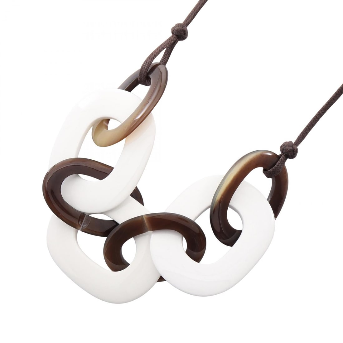 Hermes Caramba Necklace Buffalo Horn: White/brown Caramba necklace in other material and buffalo horn. Neck size 71cm, width 0.3cm, chain length 71cm, motif 55mm x 45mm.