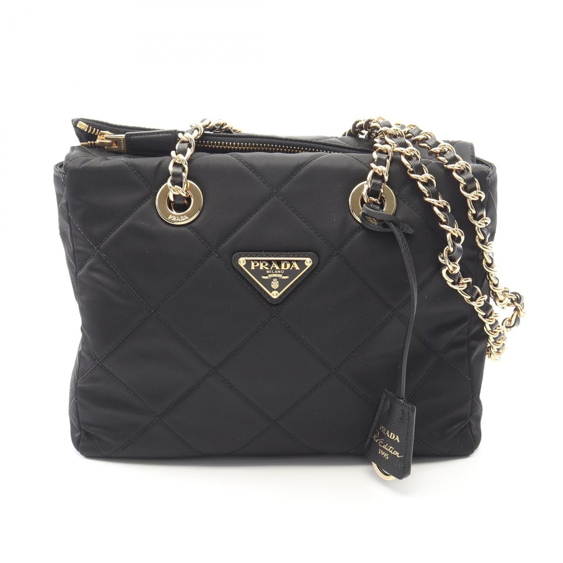 Prada Re-Edition 1995 Chain Black: Black Re-Edition 1995 chain shoulder bag in nylon and Saffiano leather. No accessories. 25 x 19 x 7 cm. Strap drop 38 cm. Shoulder 90 cm.