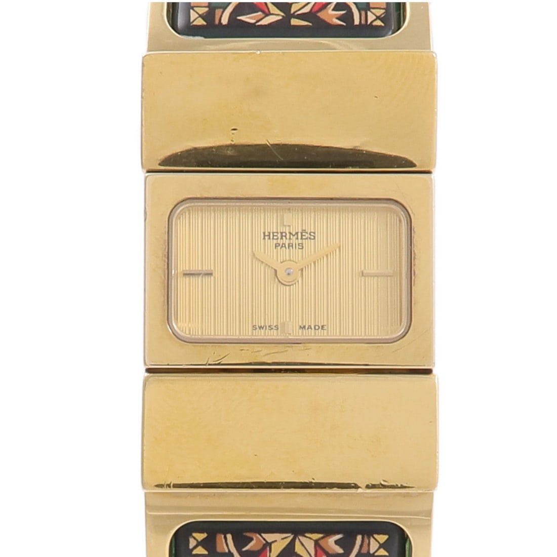 Hermes Loquet Green L01.201 Gold Plated: Quartz watch. Color: Gold / Gold. Material: Gold Plated. Accessories: Guarantee. Case 29mm x 19mm; max wrist 15.5cm; band 19mm.