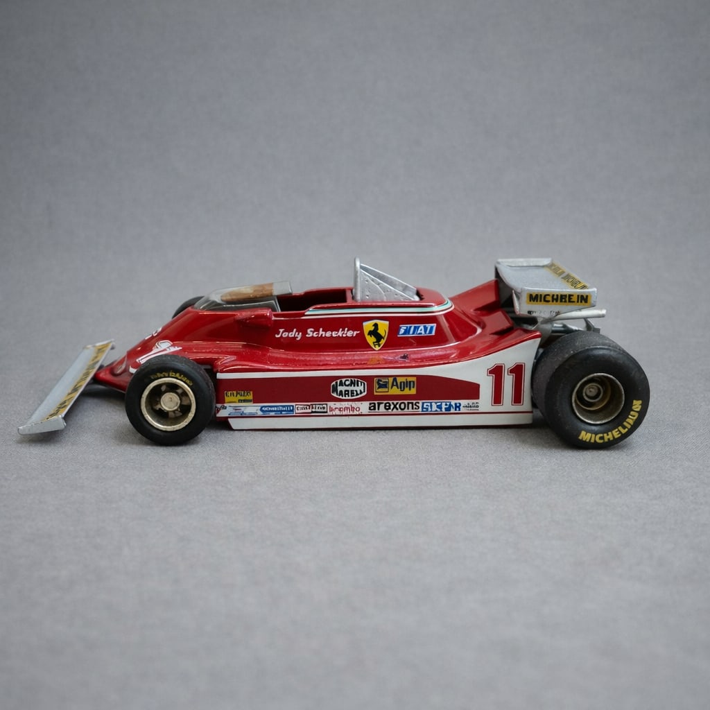Western Models 1:43 Ferrari F1 Jody Scheckter: White metal 1:43 scale Formula 1 race car by Western Models, finished in Ferrari red No. 11 livery for Jody Scheckter of Ferrari. Good display condition with light handling wear. Minor decal wear. See
