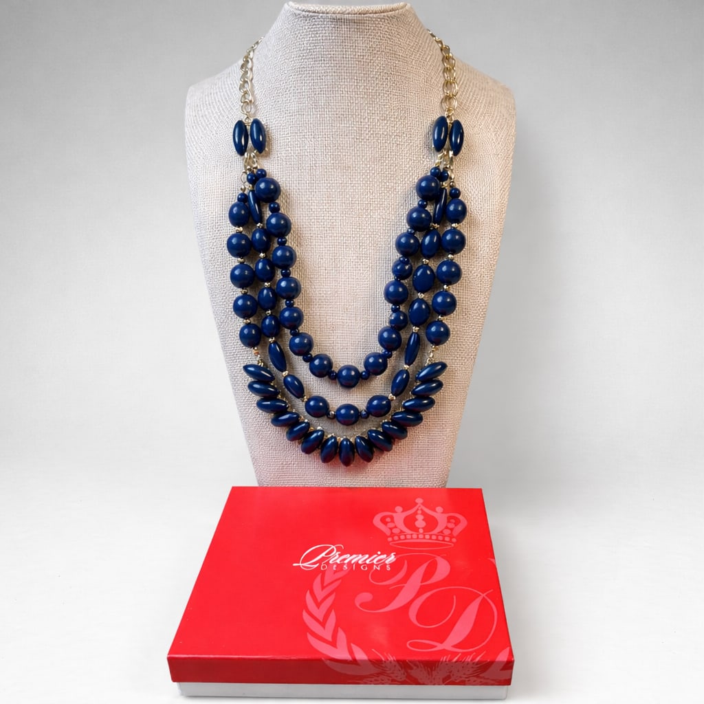 New Premier Designs Navy Multi-Strand Statement Necklace: New Premier Designs multi-strand statement necklace in rich navy blue, featuring layered glossy beads and an articulated marquise-style collar front, accented with gold-tone spacer details. Finished w