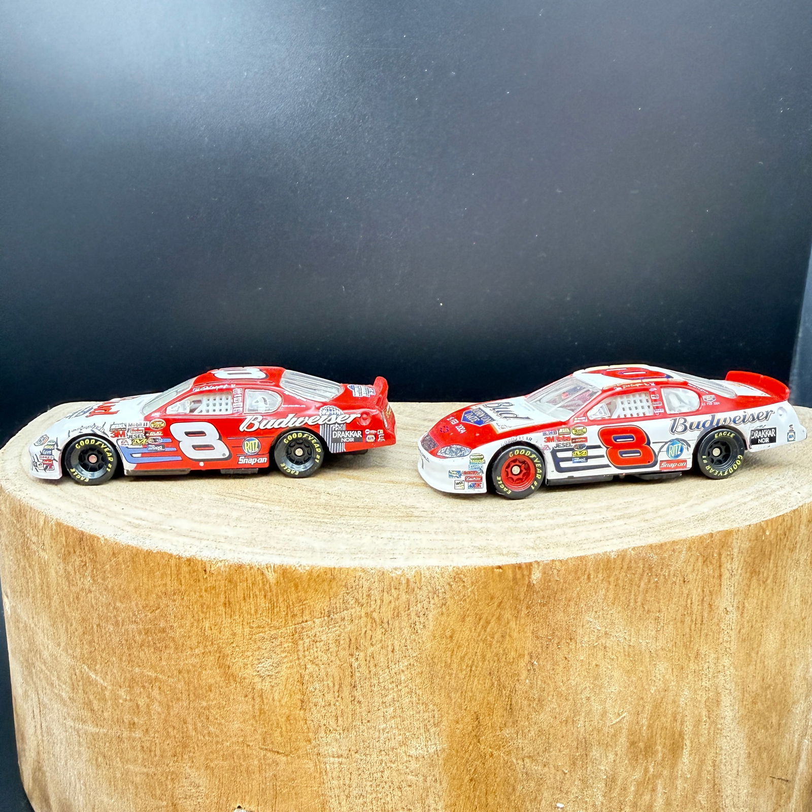 Two Action Performance Dale Earnhardt Jr. Budweiser Monte Carlo Diecast Cars: Pair of Action Performance diecast NASCAR stock cars representing Dale Earnhardt Jr. in his iconic No. 8 Budweiser Chevrolet Monte Carlo livery.Nice display condition.