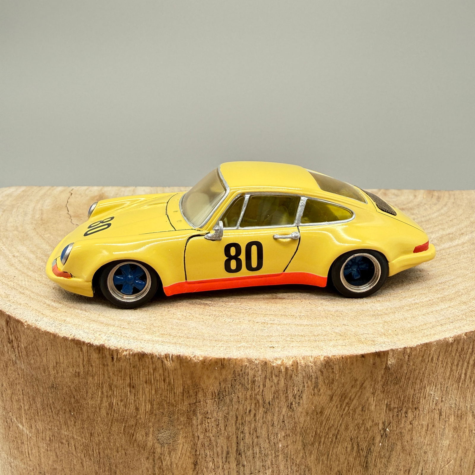 AMR Porsche 911S Gr.4 #80 1:43 Andre M Ruf: Scale 1:43 white-metal Porsche 911S Group 4 racing model by André M. Ruf (AMR), made in France. Finished in bright yellow with race number 80.Assembled and finished by DBR (Robb Brown), with builder