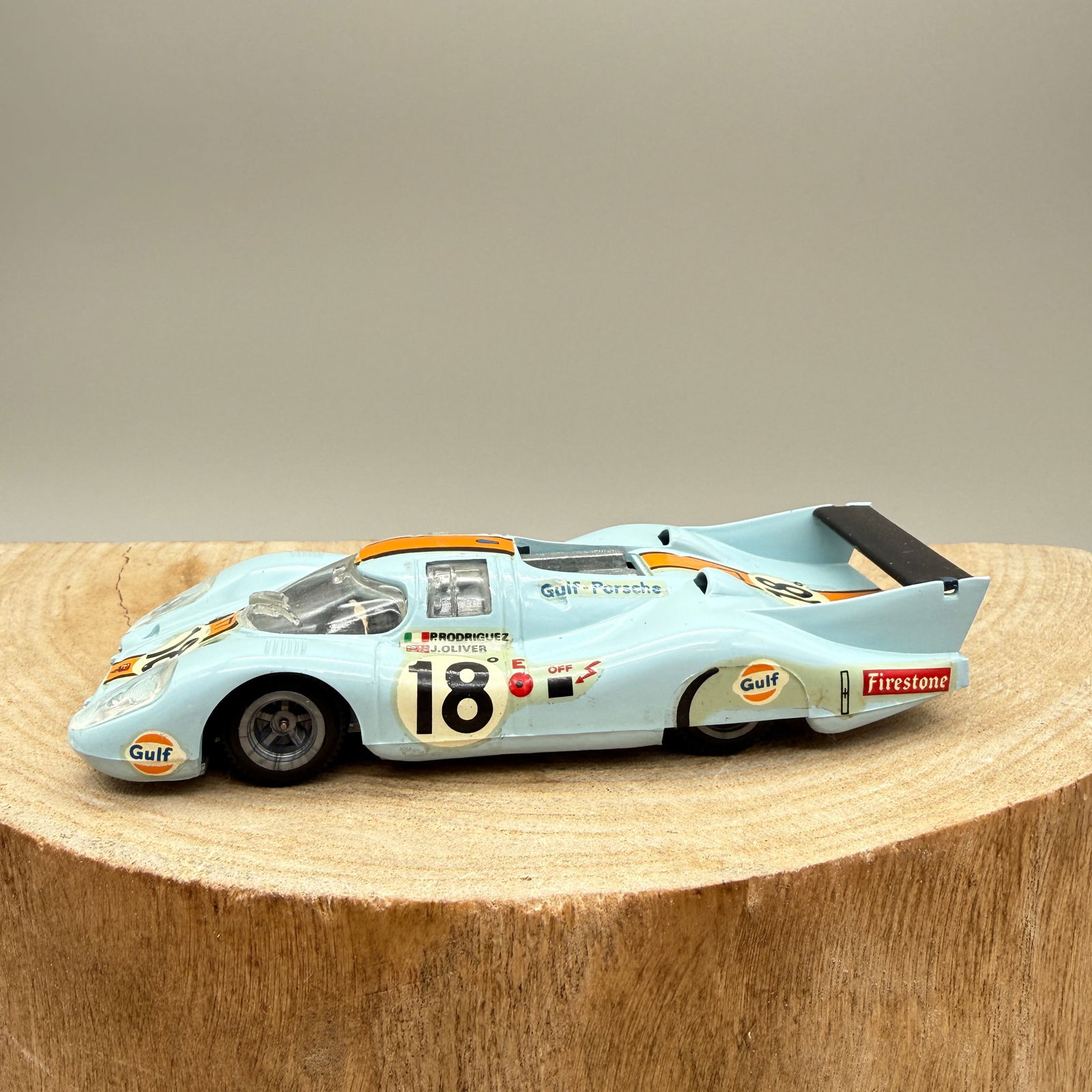Modele Depose Super Champion Porsche 917 1:43: French white metal model of a Porsche 917 race car in Gulf livery, marked “Super Champion,” “Porsche 917,” and “Modèle Déposé” to the underside. Base also stamped “ECH 1/4