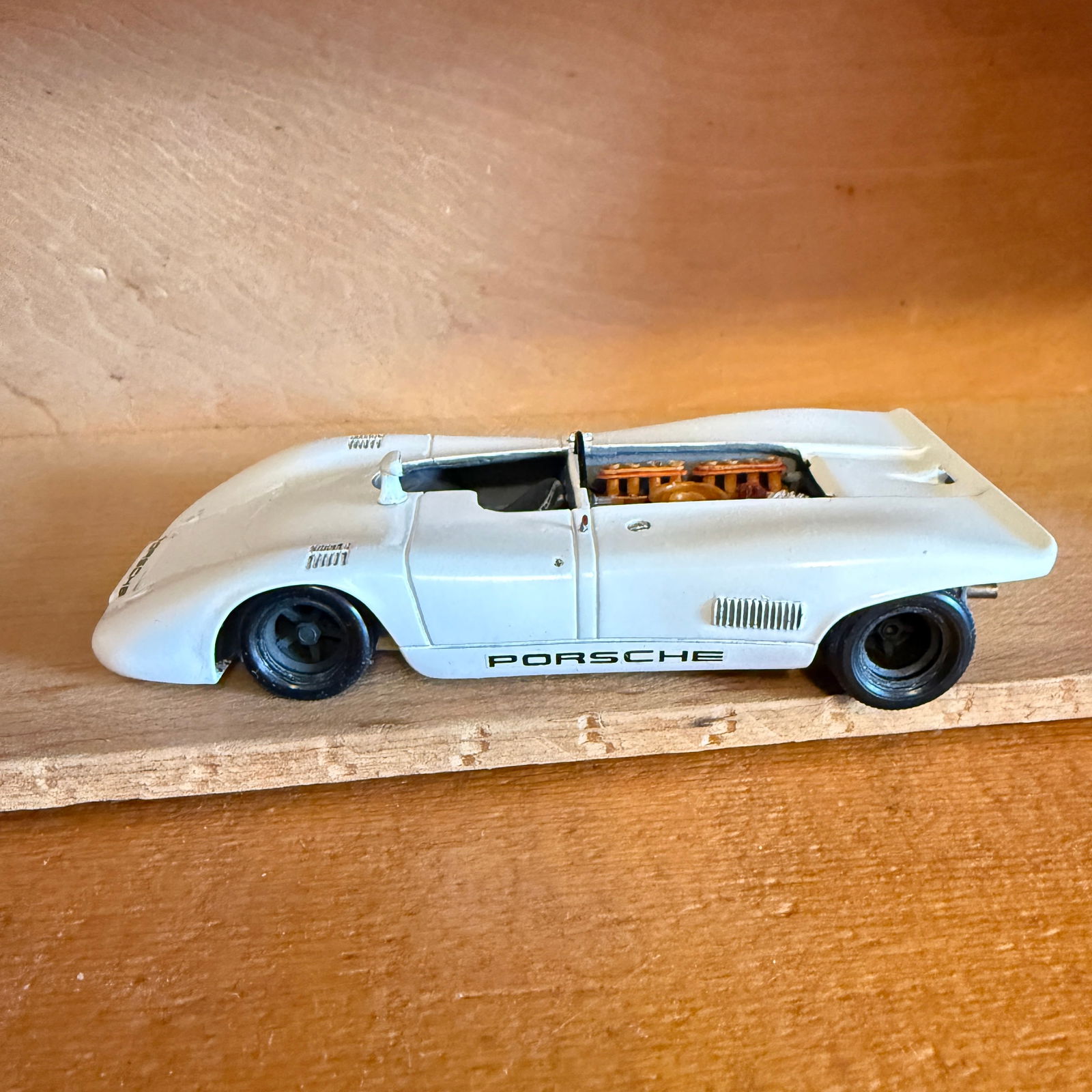 DBR Built 1:43 Porsche 917/10 Vroom Resin Model: Hand-built 1:43 scale Porsche 917/10 Can-Am racing model constructed from a Vroom resin kit and signed on the underside “DBR 12/17.” The base is marked “Porsche 917 /10 Cyl. – Model by Vro