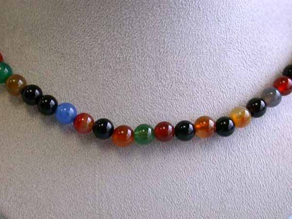 Multi-colored Agate Stones with Silver Clasp: Agate Necklace around 6 mm w/ Silver Clasp and approximately 15 inches long.