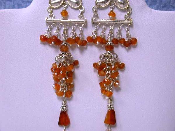 Silver and Carnelian Dangling Earrings: Silver and Carnelian Dangling Earrings about 3.5 inches long and weighs 11.8 grams