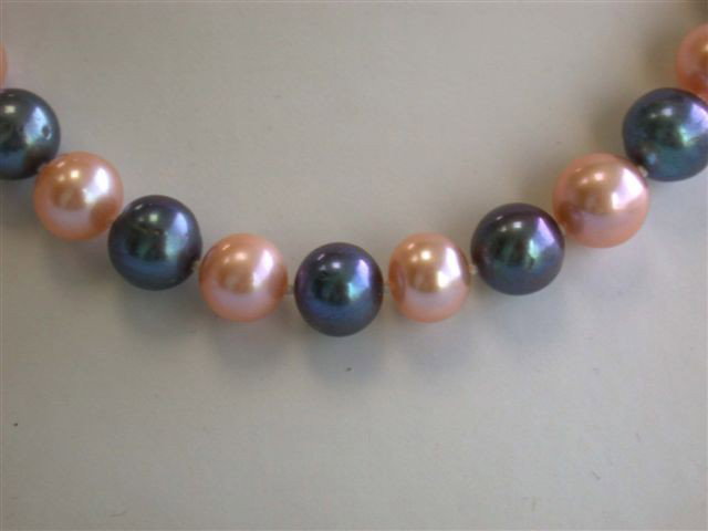 Colored Pearl Necklace with 14k Yellow Gold Clasp: Pearl Necklace- approximately 9 mm (bead size) with 14k Yellow Gold Clasp. The Length is approximately 18.5 inches long and weighs 49.6 grams