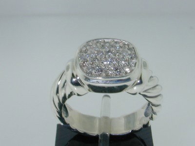 David Yurman Silver Diamond Ring: David Yurman Silver, Diamond Ring. The total ring's weight is 5.6 grams. The total weight of diamond is 25 pts. approximately , H color VS clarity. The size of the ring's surface is 11x9 mm and 6 mm t