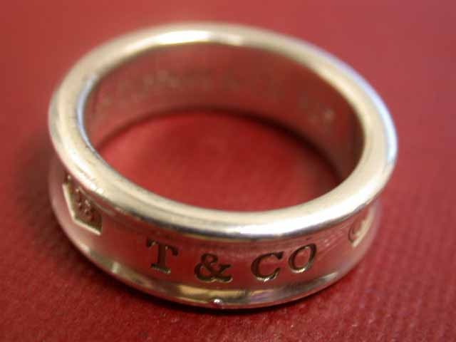 Tiffany 1837 Ring: Sterling Silver Tiffany Ring. The ring size is 7 3/4 and the width - approximately 1/4 inch wide