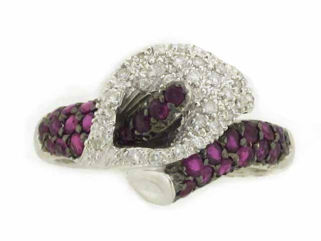 18k White Gold Ring with Diamonds and Rubies: 18k White Gold Ring with Diamonds - 0.20 carat, 32 pieces, G color and VS clarity and Ruby - 0.80 carat, 27 pieces. The ring size is 6.5 and weighs 5.55 grams