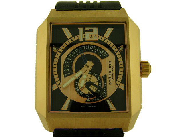 Stuhrling 284 Metropolis Auto RetroGrade Date 16KGP Men: This is a Stuhrling 284 Metropolis Auto RetroGrade Date 16KGP Mens Watch with the following features: Rectangular-Shaped 316L Surgical Grade Stainless Steel Case; 5-Piece Dial; Ribbon Striped Main Dia