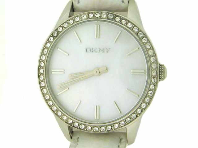 DKNY Women's Watch NY4790: This is a DKNY Women's Watch NY4790 with the following features: mother of pearl dial with black indices, markers, and hands; crystal encrusted bezel, white leather band, water resistant to 50 meters,