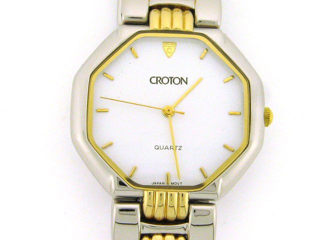 Croton Men's 23k Gold Plated Dress Watch: This is a Croton Men's 23k Gold Plated Two Toned Dress Watch with the following features: Japan quartz movement; All stainless steel back; Silver and Gold tone steel construction; Mineral crystal face