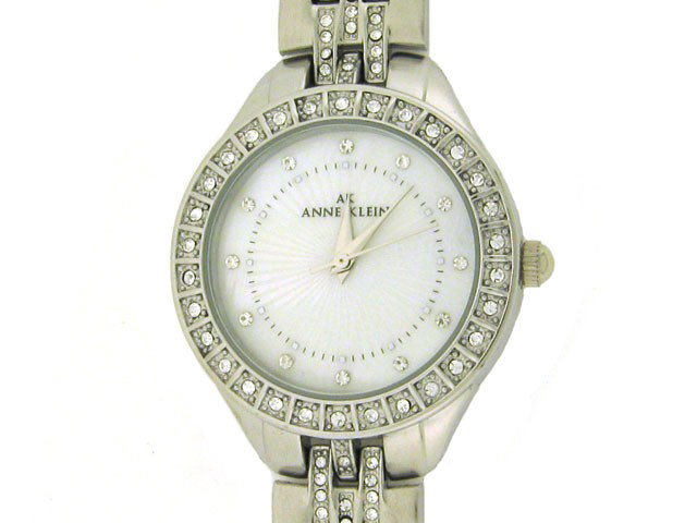 AK Anne Klein Silver-tone Bracelet Mother-of-pearl: Japanese quartz movement, Silver-tone hands and sweep seconds, Crystal dot markers with black indices, Silver-tone metal bracelet with crystals and jewelry-clasp, Silver-tone metal round case with cry