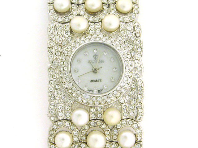 Croton Watch with crystal and pearl bracelet CN207: This is a Croton Watch with crystal and pearl bracelet CN207280 with the following features: stainless steel with crystal and pearl bracelet; Quartz movement; Stainless Steel back; crystal case and be