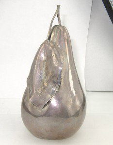 Buccellati Silver Cigarette Lighter: Buccellati Silver Cigarette LighterThe total weight of lighter is 236.8 grams. Buccellati sterling silver lighter in form of pear with leaf, lighter concealed in base, marked "Buccellati Sterling"The