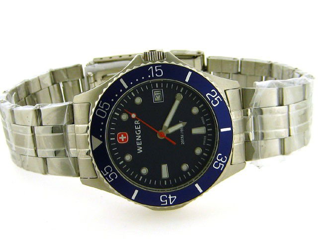 WENGER SWISS MILITARY STEEL 20 ATM AQUA DIVER DATE WATC: This is a MENS WENGER SWISS MILITARY STEEL 20 ATM AQUA DIVER DATE WATCH with the following features: Swiss quartz movement; Water resistant; Stainless steel case; Brushed case finish; Screw-on case ba