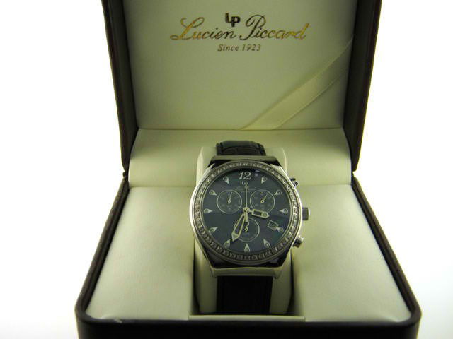 Lucien Piccard 26384WHCZ Watch: This is a Lucien Piccard 26384WHCZ watch with the following features: stainless steel, round oversized bezel with diamonds; leather strap; Bezel has 44 sparkling diamonds that measure 1.8 mm each with
