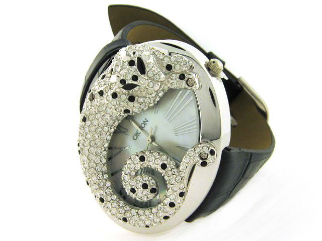 CROTON LADIES WATCH CN207338 LEOPARD CRYSTAL MOP BLACK: This is CROTON LADIES WATCH CN207338 LEOPARD CRYSTAL MOP BLACK with the following features: Japan quartz movement; Stainless steel case; Mother of Pearl; Bezel has crystals with onyx; and water resist