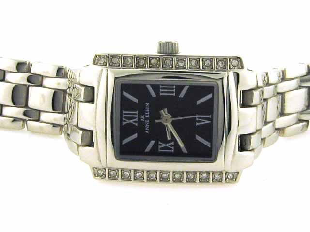AK Anne Klein Crystal Collection Black Dial Women's wat: This is an AK Anne Klein Crystal Collection Black Dial Women's watch #10/8669BKSV with the following features: Dress watch, Japanese quartz movement, silver-tone hands and sweep seconds, silver-tone R