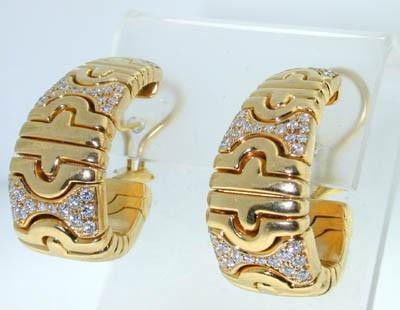 Bvlgari 18K Yellow Gold Diamond Earrings: Bvlgari 18K Yellow Gold Diamond Earrings.The total earring's weight is 44.7 grams.The total weight of Diamond: 1.48cts, G color and VVS clarity.The size of the earring: 30x15mm.This is a wonderful Ear