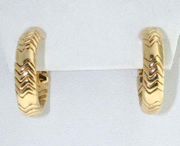 Bvlgari 18K Yellow Gold Earrings: Bvlgari 18K Yellow Gold Earrings.The total earring's weight is 19.8 grams.The size of the earring: 21 x 21 mm