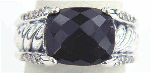 David Yurman Silver Black Onyx & Diamond Ring.: This is a Wonderful David Yurman Silver Onyx & Diamond Ring.The total ring's weight is 9.0 grams.The size of the Onyx is 11 x 13 mm.The size of the ring is 7.There is a stamp "925" stamp on it.