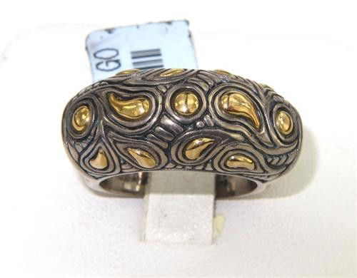 BJC 18K Yellow Gold/Silver Ring: BJC 18k Yellow Gold/Silver Ring. The total ring's weight is 12.9 grams. The measurement of ring surface: 26 x 10 mm and 6 mm in thickness. The size of the ring is 7.