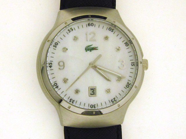 LACOSTE WOMEN'S Black CALFSKIN DIAMOND WATCH: This is a LACOSTE WOMEN'S Black CALFSKIN DIAMOND WATCH with the following features: Quartz movement; Crystal mineral; Buckle clasp; Stainless Steel case; 40 mm case diameter; Leather calf skin band; 3