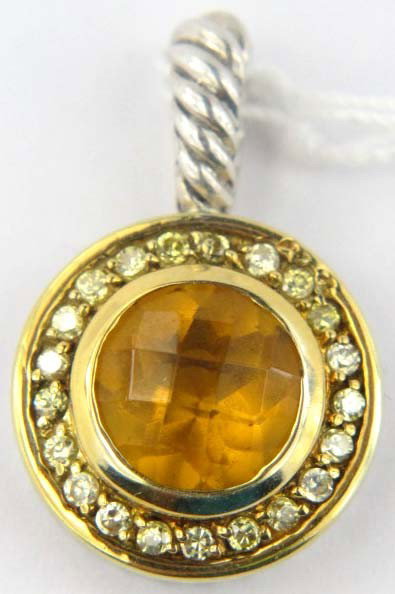 David Yurman 18ky Gold & Silver Diamond Citrine Pendant: David Yurman 18K Yellow Gold&Silver Diamond Citrine Pendant.The total weight of the pendant is 3.9 grams.The size of the citrine is 8 mm round.The measurement of the pendant is 22x14mm.Diamonds weight