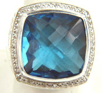 David Yurman Silver Blue Topaz Diamond Ring: David Yurman Silver Blue Topaz Diamond ring. The total ring's weight is 23.6 grams. The size of the Blue Topaz is 21 x 21 mm. The size of the ring is 8.75
