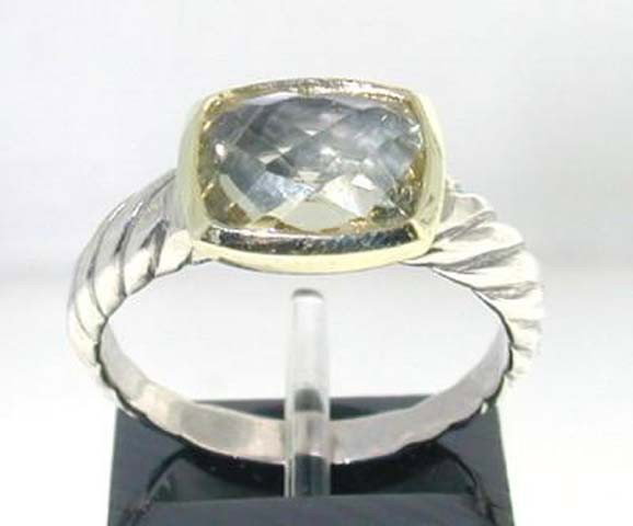 David Yurman 18k Gold/ Silver Prasiolite Ring.: This is a Wonderful David Yurman 18k Gold/Silver Prasiolite Ring. The total ring's weight is 4.3 grams. The size of the Prasiolite is 10 x 8 mm. There is D.Y',925" 750"stamp on it. The size of the rin