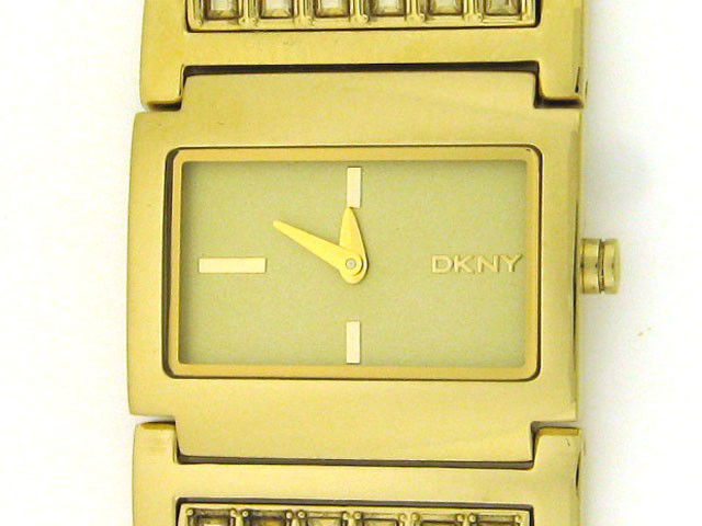 DKNY Women's Watch: Gold Tone Stainless steel case and band with a jewelry clasp, gold analog display, quartz movement, Water resistant to 30m, gold dial, 28 mm case diameter, 8 mm case thickness, and watch length is app