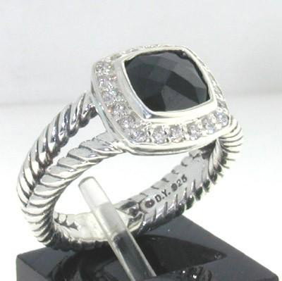 David Yurman Silver Onyx & Diamond Ring.: This is a Wonderful David Yurman Silver Onyx & Diamond Ring. The total ring's weight is 5.7 grams. The total weight of the diamond is 0.2 cts approximately, I color SI clarity. The size of the Onyx is
