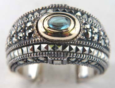 Judith Ripka Silver Blue Topaz Ring: Judith Ripka Silver Blue Topaz Ring.The weight of the ring is 9 grams.The size of the ring is 6.75