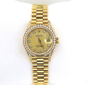 Rolex 18K Yellow Gold Diamond Watch: Rolex 18K Yellow Gold Diamond Oyster Perpetual DateJust, Sapphire Crystal, QuickSet Watch. The total watch's weight is 72.8 grams. The total weight of diamond: 1.5 cts. H color VS clarity. The size of