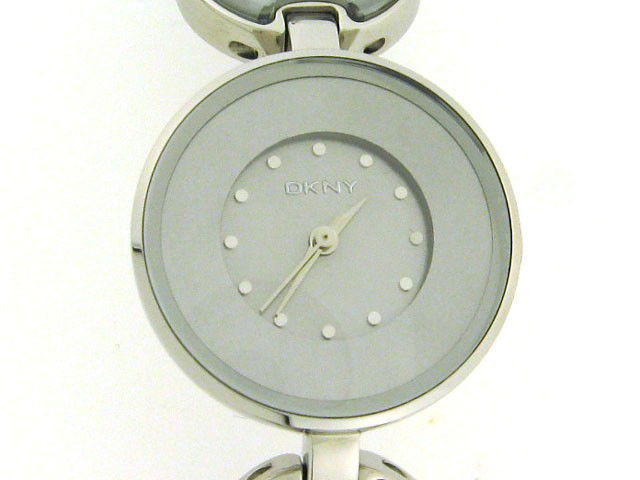 DKNY Women's Watch NY4720: This is a DKNY Women's Watch NY4720 with the following features: plated mother-of-pearl discs, chrome-plated dial, The round golden face, durable mineral crystal, quartz movement, analog display, wate