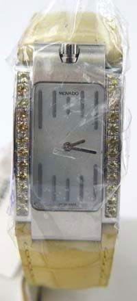 Movado alligator strap watch: Movado alligator strap watch. The total weight of the watch is 36.5grams. The length of the watch is 8".​