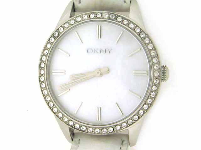 DKNY Women's Watch NY4790: This is a DKNY Women's Watch NY4790 with the following features: mother of pearl dial with black indices, markers, and hands; crystal encrusted bezel, white leather band, water resistant to 50 meters,